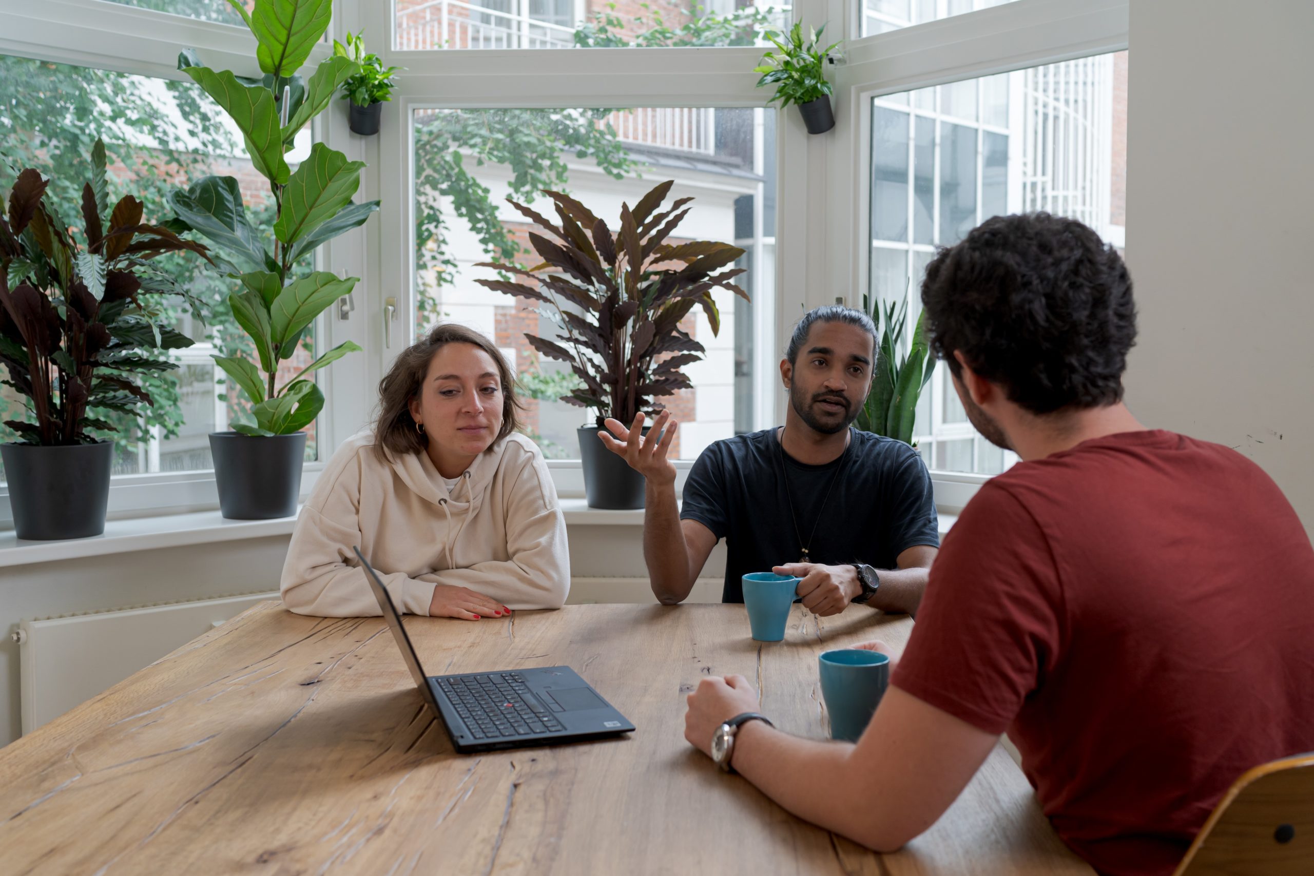enterprise seo marketing team discussing which software platform they want to use for SEO